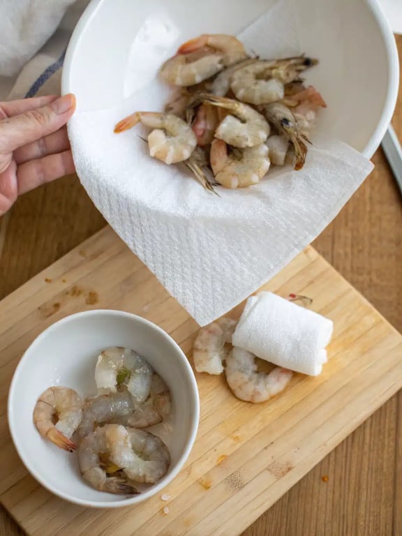 Step 2 for air fryer shrimp — process in progress