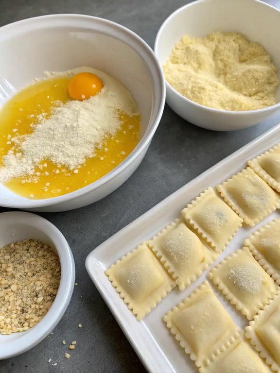 Step 2 for toasted ravioli recipe — process in progress