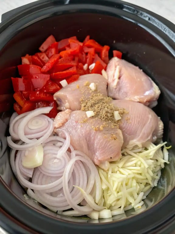 Step 2 for slow cooker chicken corn — process in progress