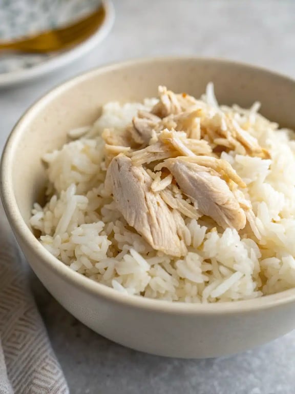 instant pot chicken rice plated with a fresh green salad