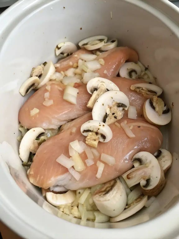 Step 2 for crockpot angel chicken — process in progress