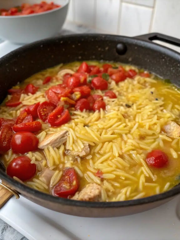 Step 4 for one pot orzo — checking the texture while simmering