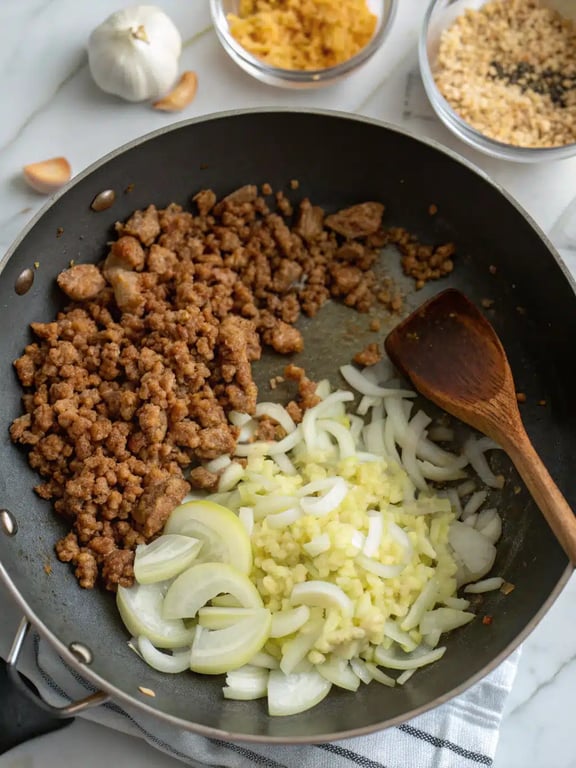 Step 2 for egg roll bowl — process in progress