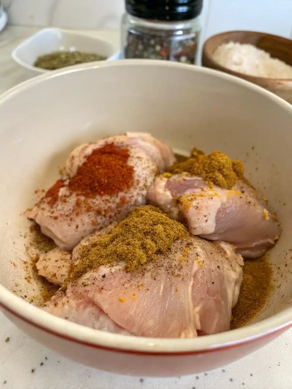 Step 2 for sheet pan chicken pitas — process in progress