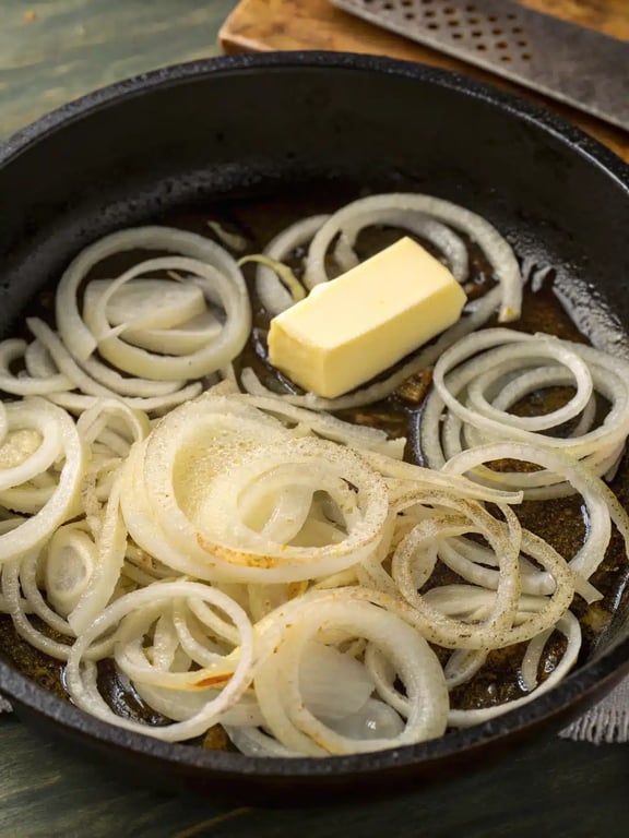 Step 2 for French onion grilled cheese — process in progress