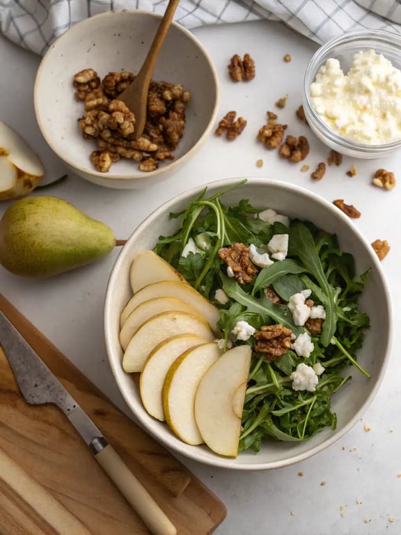 Step 4 for pear arugula salad — whisking the honey lemon dressing