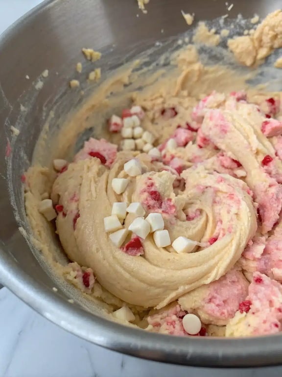Step 4 for strawberry cheesecake cookies — texture check