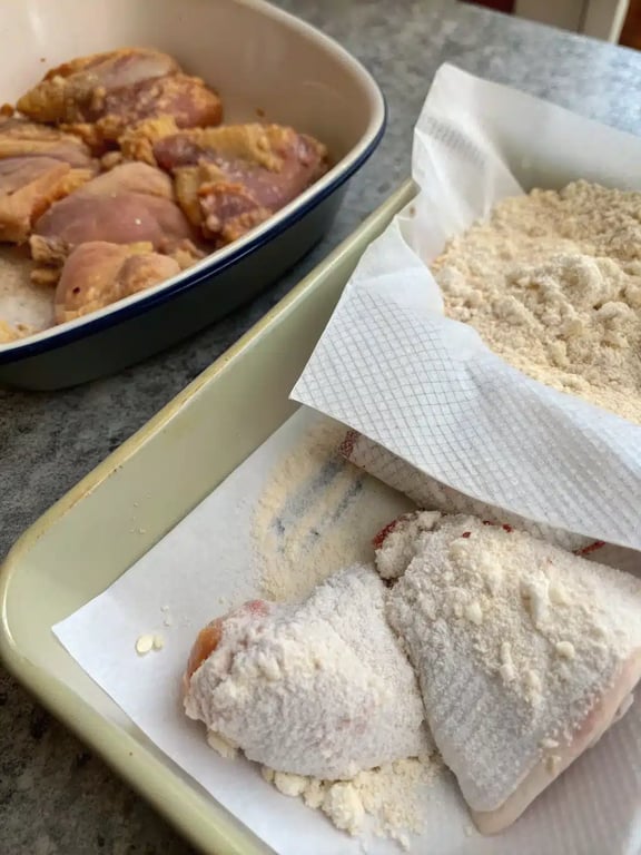 Step 2 for crispy dill chicken — process in progress