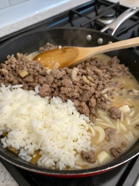 Step 4 for hamburger rice casserole — texture check