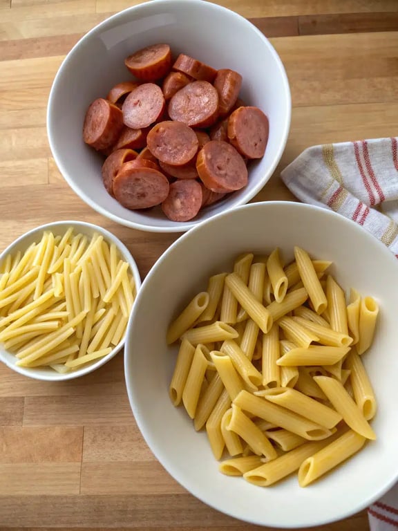 Step 2 for Cajun sausage pasta — process in progress