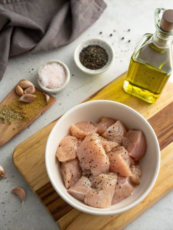 Step 2 for creamy chicken alfredo — process in progress