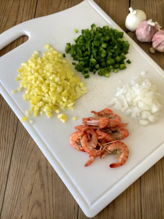 Step 2 for crawfish queso recipe — process in progress