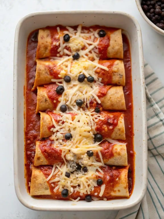 Final step for bean cheese enchiladas — plated and ready