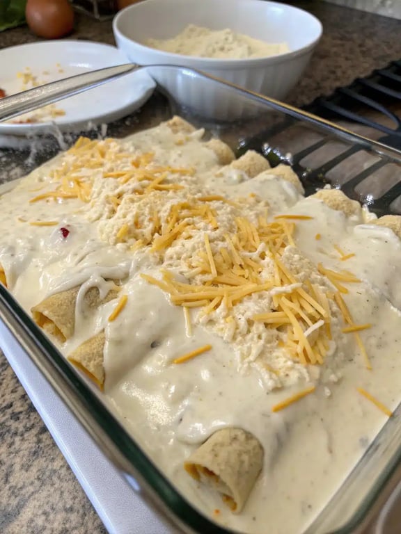 Final step for white chicken enchiladas — plated and ready
