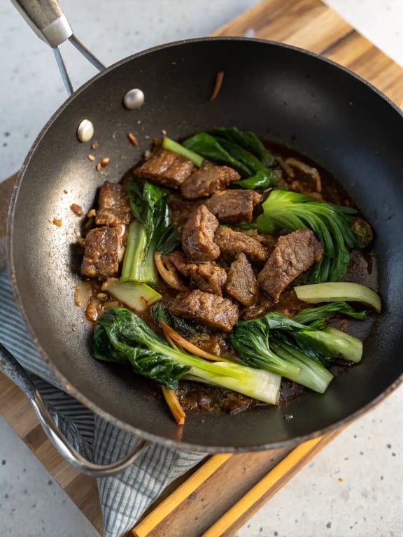 Final step for bok choy beef stir fry — plated and ready