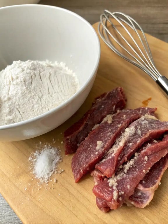 Step 2 for Crispy Chilli Beef — process in progress