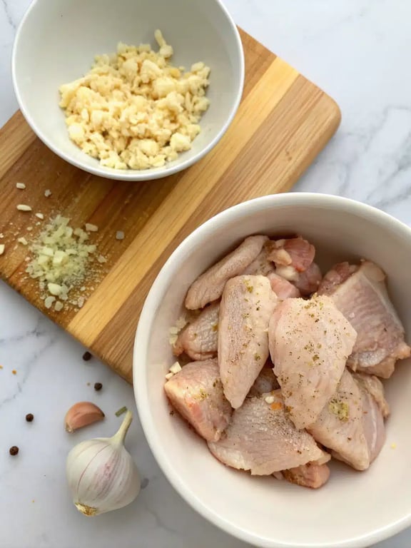 Step 2 for garlic chicken noodles — process in progress