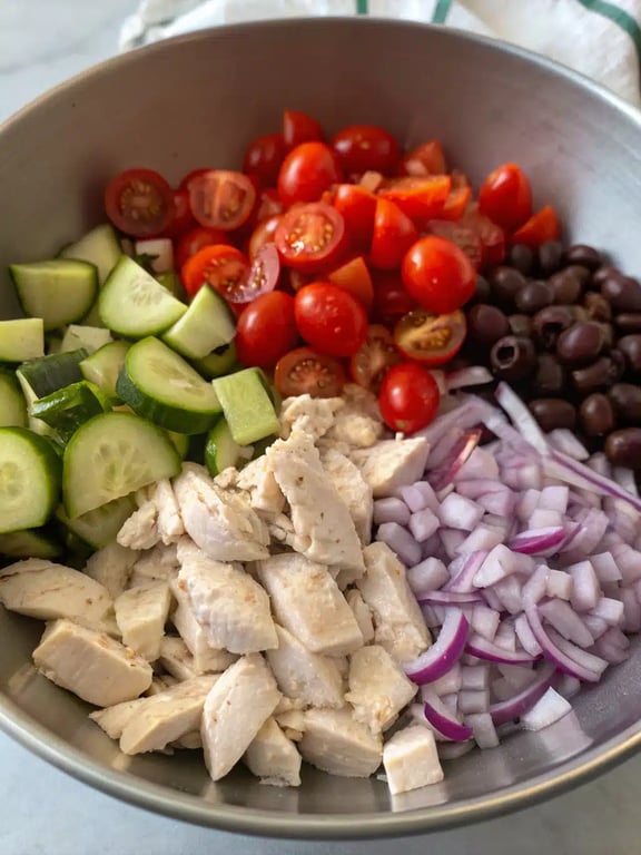 Final step for Mediterranean chicken salad — plated and ready