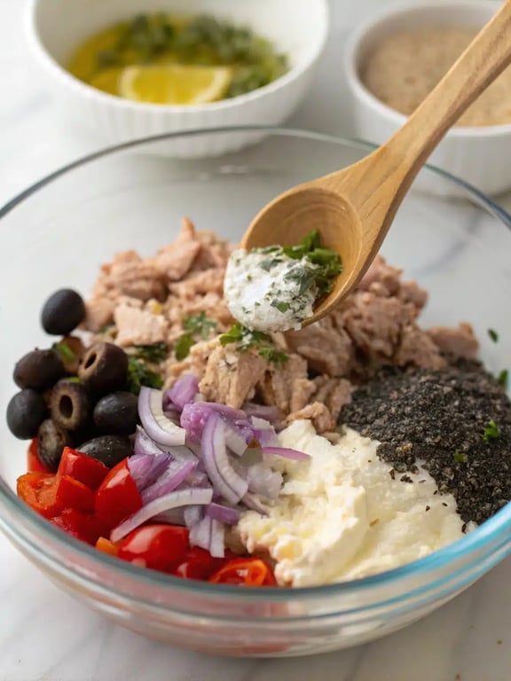 Step 4 for Mediterranean tuna salad — texture check