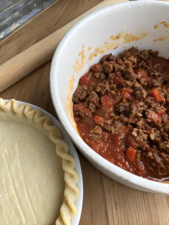 Step 4 for pizza burger pie — texture check