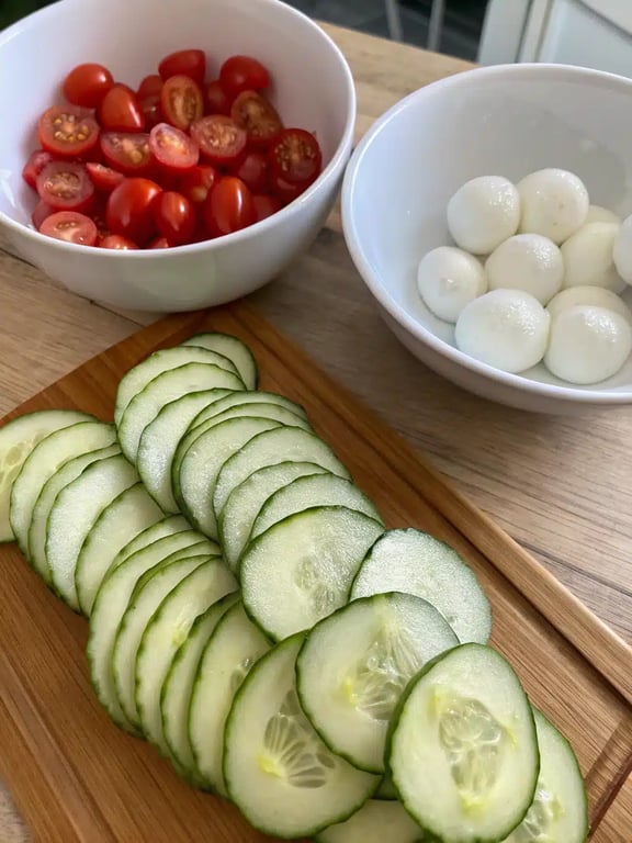 cucumber caprese salad — step 2 Step 2 for cucumber caprese salad — process in progress