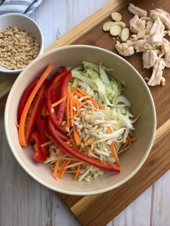Step 4 for Thai peanut chicken salad — texture check