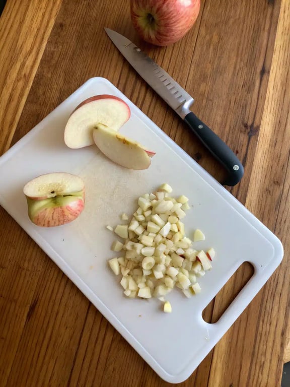 Mixing the wet and dry ingredients for air fryer apple fritters batter