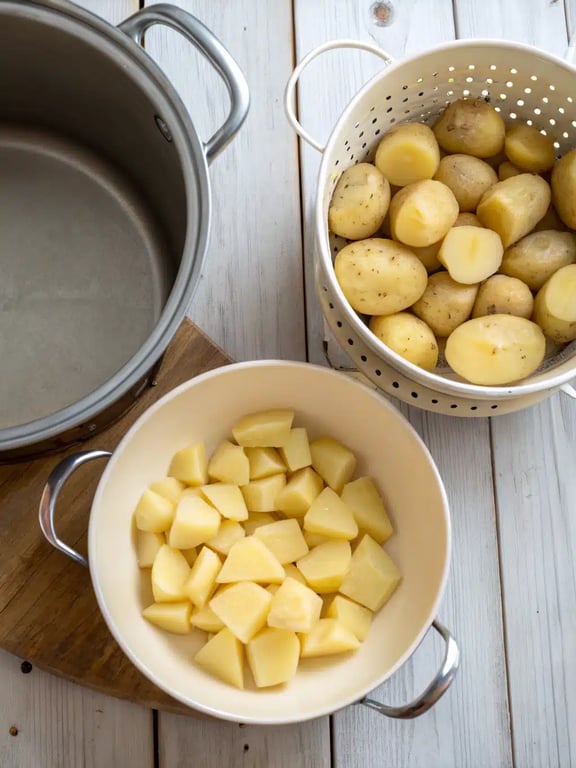 Step 2 for crispy potato balls — process in progress