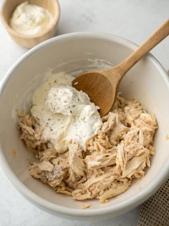 Step 2 for easy party appetizers — mixing the creamy ranch and cream cheese filling