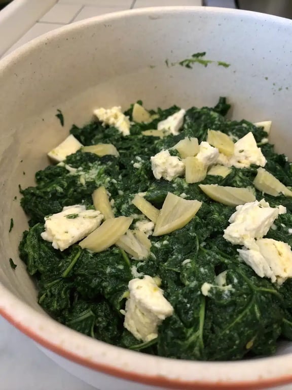 Step 4 for spinach artichoke wontons — texture check