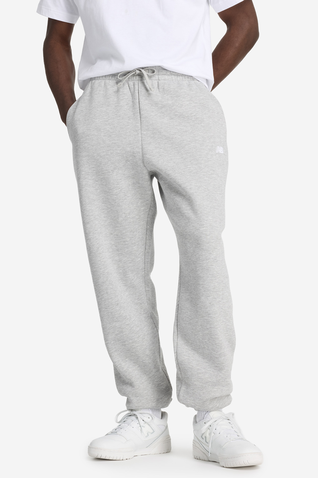Spodnie NEW BALANCE MP41503AG Szary