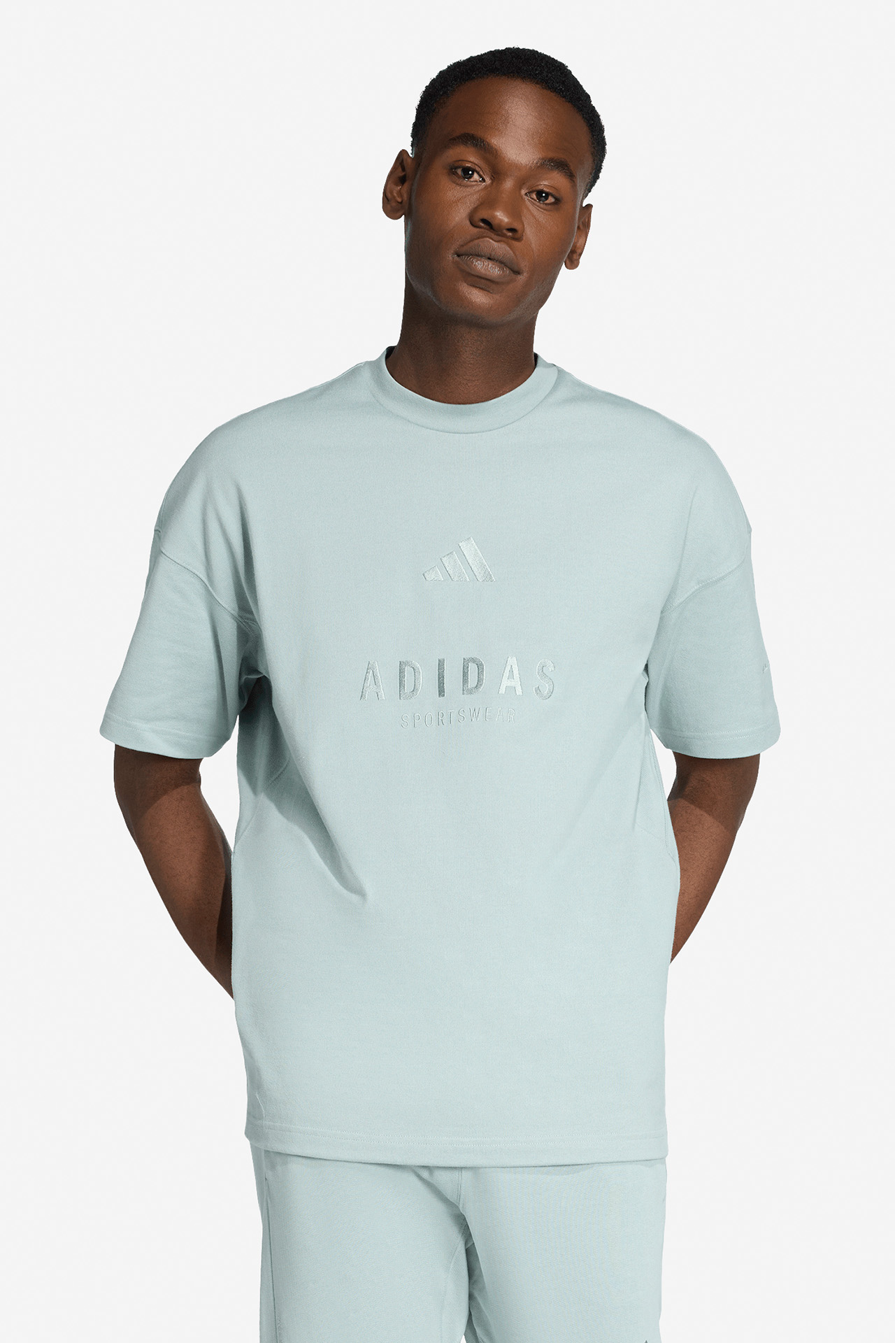 T-shirt adidas KC4656 Turkusowy
