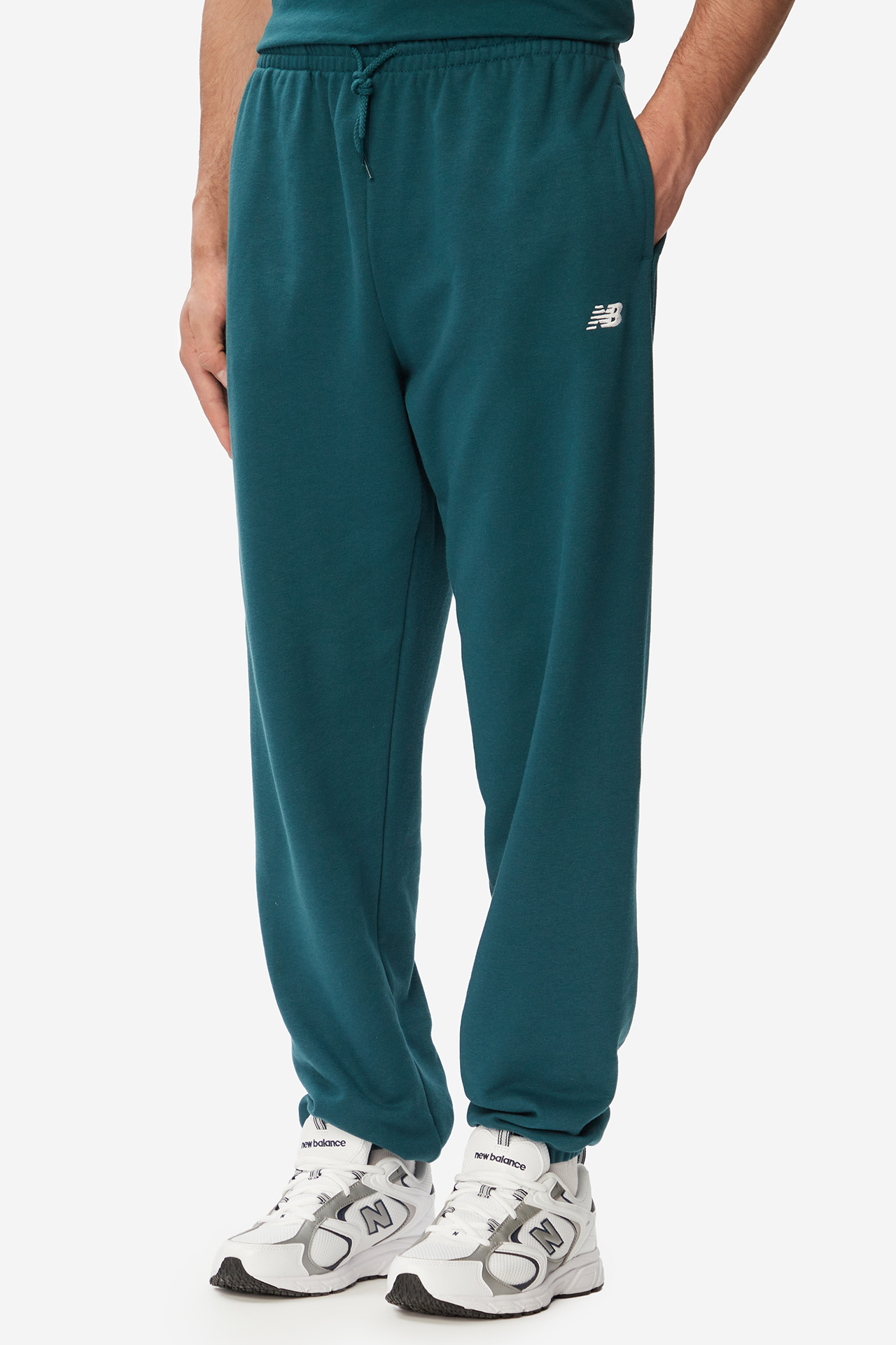 Spodnie NEW BALANCE MP41519AAV Zielony ciemny