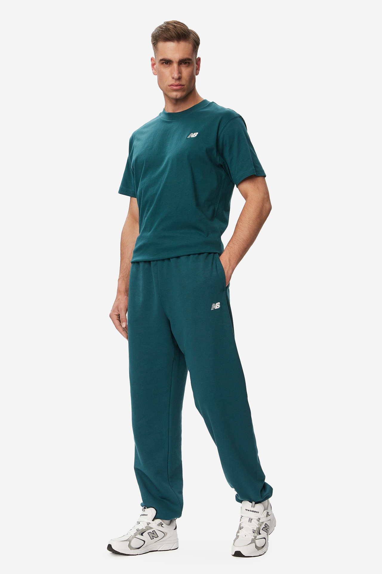 Spodnie NEW BALANCE MP41519AAV Zielony ciemny