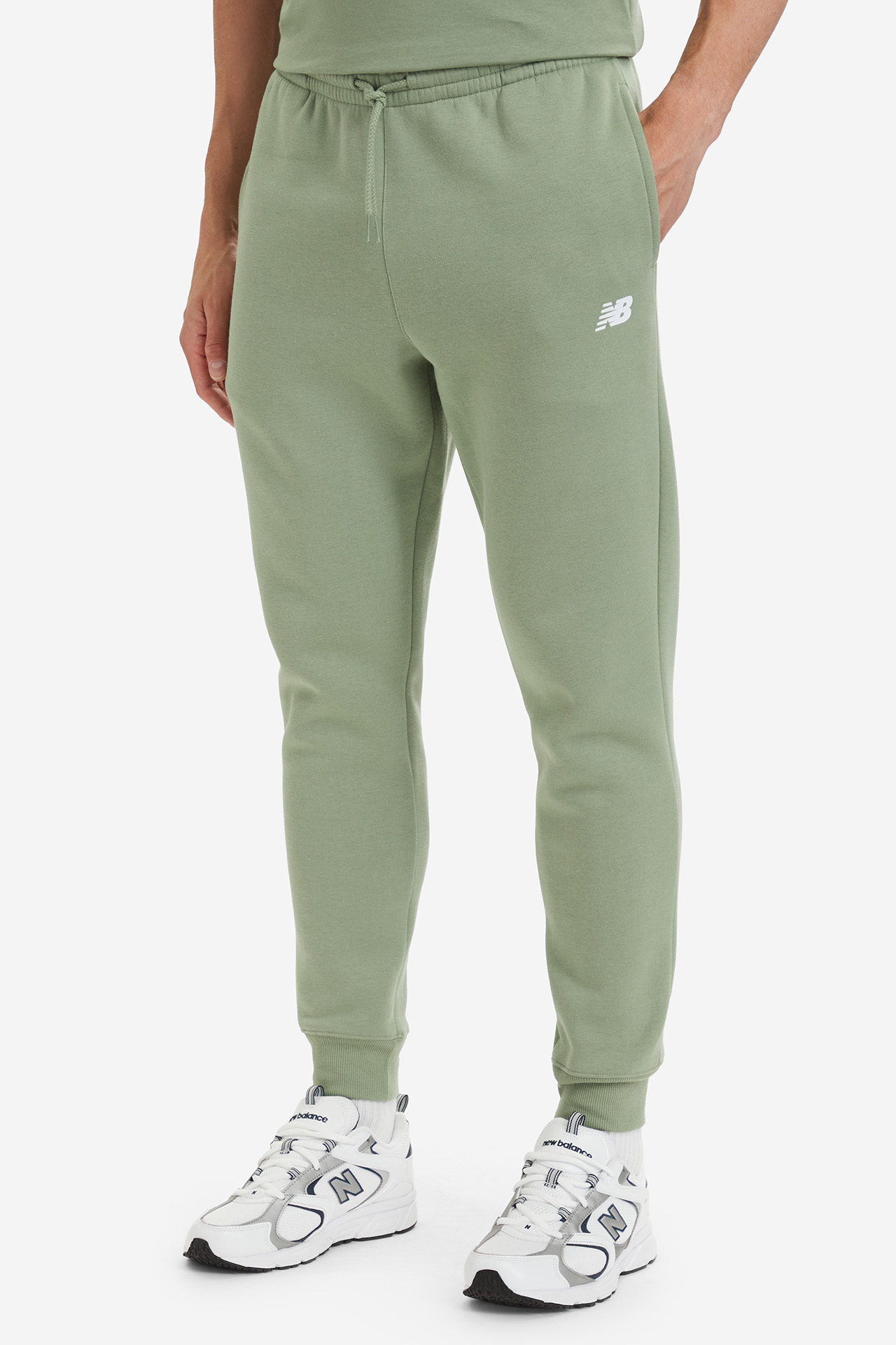 Spodnie NEW BALANCE MP43904AAR Zielony jasny