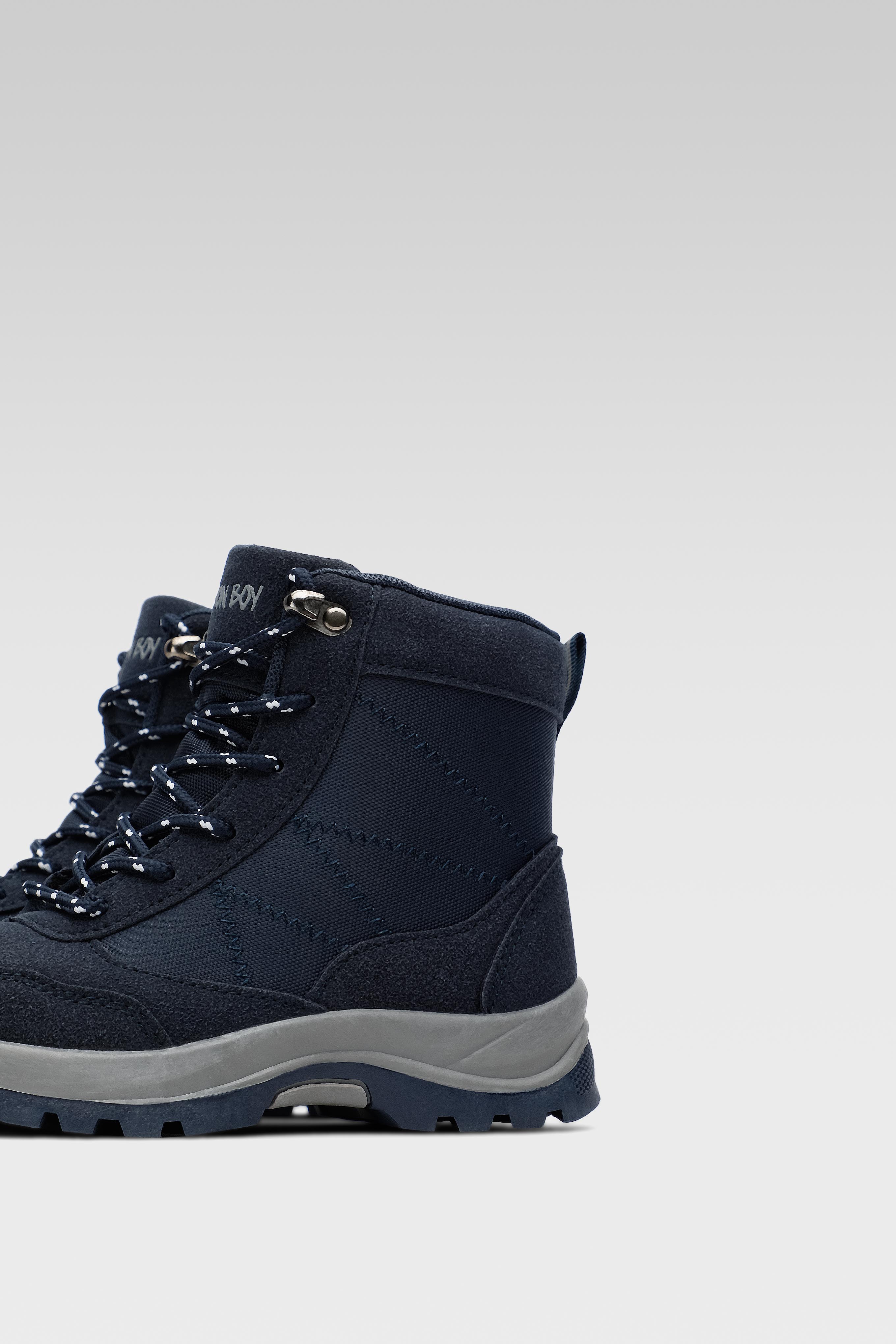 Šněrovací vyšší obuv TMAVĚ MODRÁ