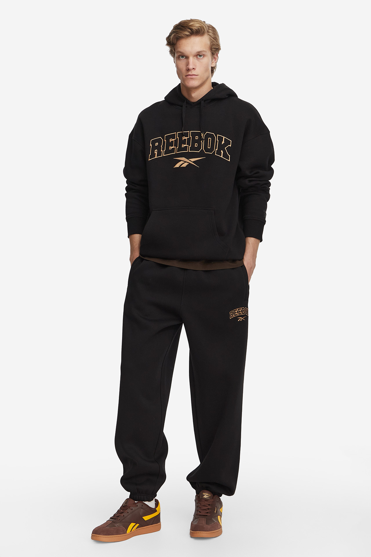 Spodnie REEBOK RK25855CCM-100003 Brązowy ciemny