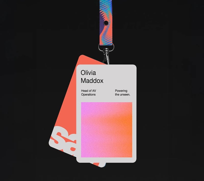 Branded ID badge and lanyard design on a black background
