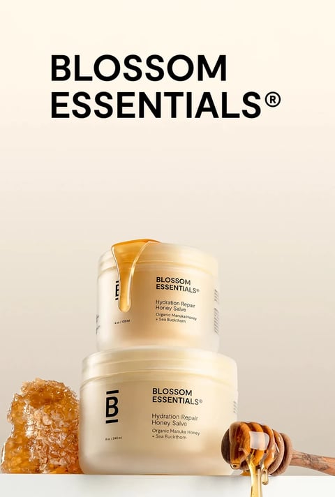 Blossom Essentials hair care jars with honeycomb and a honey dipper