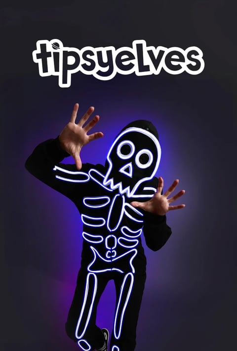 Tipsy Elves glowing skeleton costume worn against a dark background