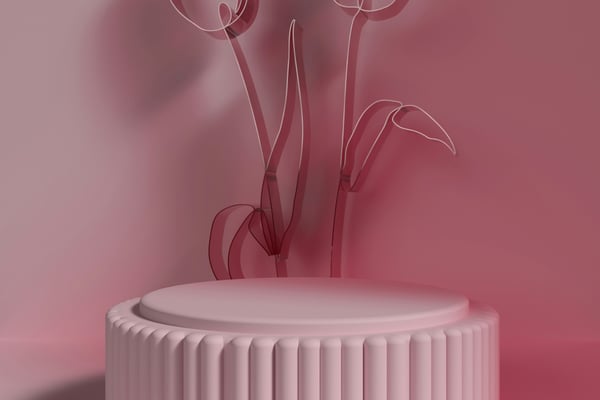 Růžový 3D vytištěný podstavec s geometrickými detaily. Za ním jsou umístěné jemné, drátěné obrysy tulipánů. Design ilustruje, jak lze pomocí 3D tisku vytvářet dekorace a umělecké předměty pro domov a zahradu.