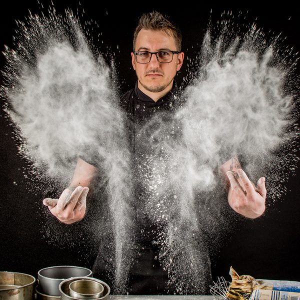 Pastry and Bakery Chef Ivan Alexandrov plays with wheat flour