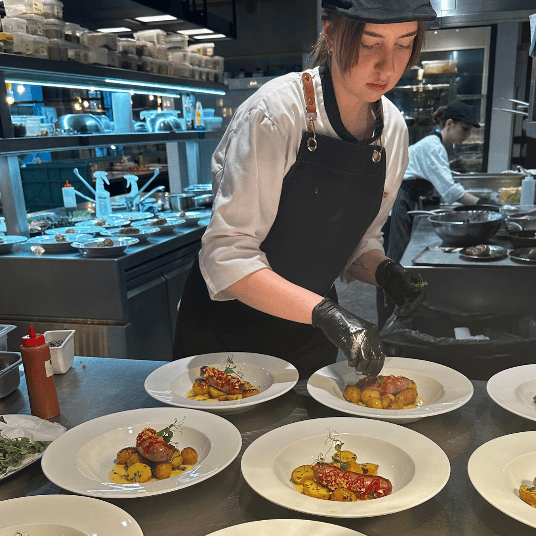 Third semester students preparing "Talk Ducky to Me" themed dinner