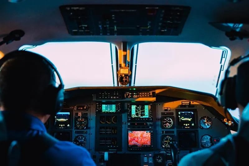 cockpit of an airplane and pilot