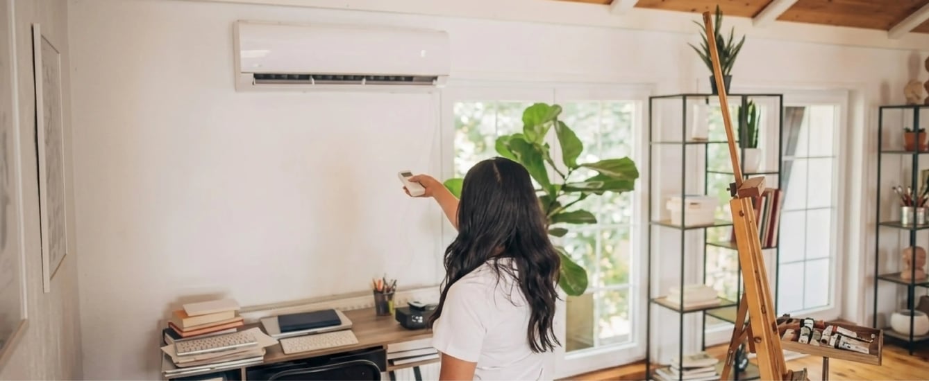 What is the ideal room temperature for comfortable living across different ages, including children and adults?