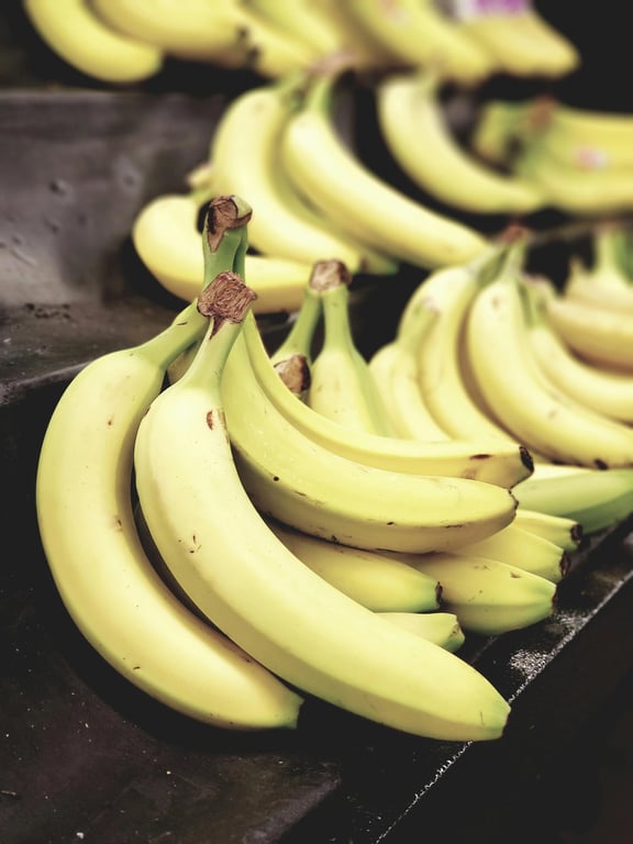 A screenshot from a fictional video game HUD showing a sanity meter labeled \"Brainrot Level\" at 100%, overlayed on a image of a smiling cartoon banana.
