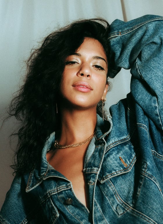 a portrait of a person styled with a grim anime war aesthetic, combining realistic shading, emotional intensity, and cinematic anime composition