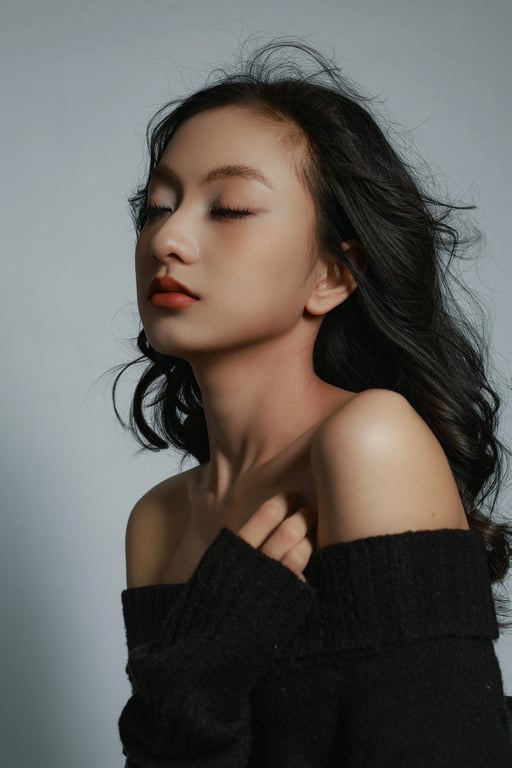 a portrait of a person styled with relaxed 70s-inspired outfit elements, casual flared bottoms, soft knit or cotton tops, understated layering, warm tones, casual stance, and soft lighting