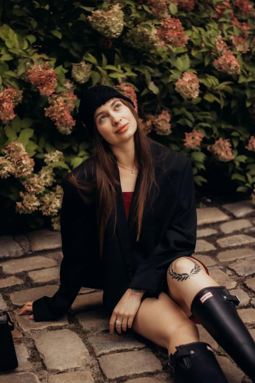 transform the image into a dating app photo by improving lighting direction, clarifying facial features, refining jaw and cheek contours in a noticeable but believable way, enhancing eye focus, simplifying background clutter, preserving identity and skin texture, and presenting the subject with a confident approachable expression that reads as authentic and clearly improved from the original