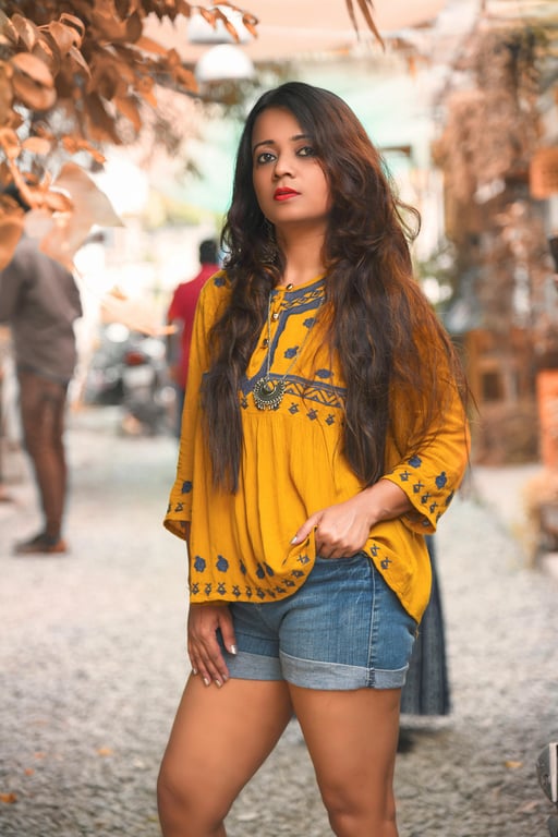 AI dress filter before photo - woman portrait in yellow blouse